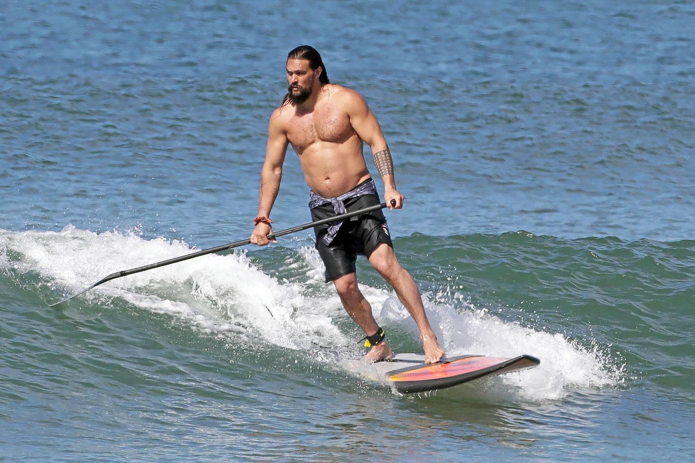 jason momoa surfing abs hawaii