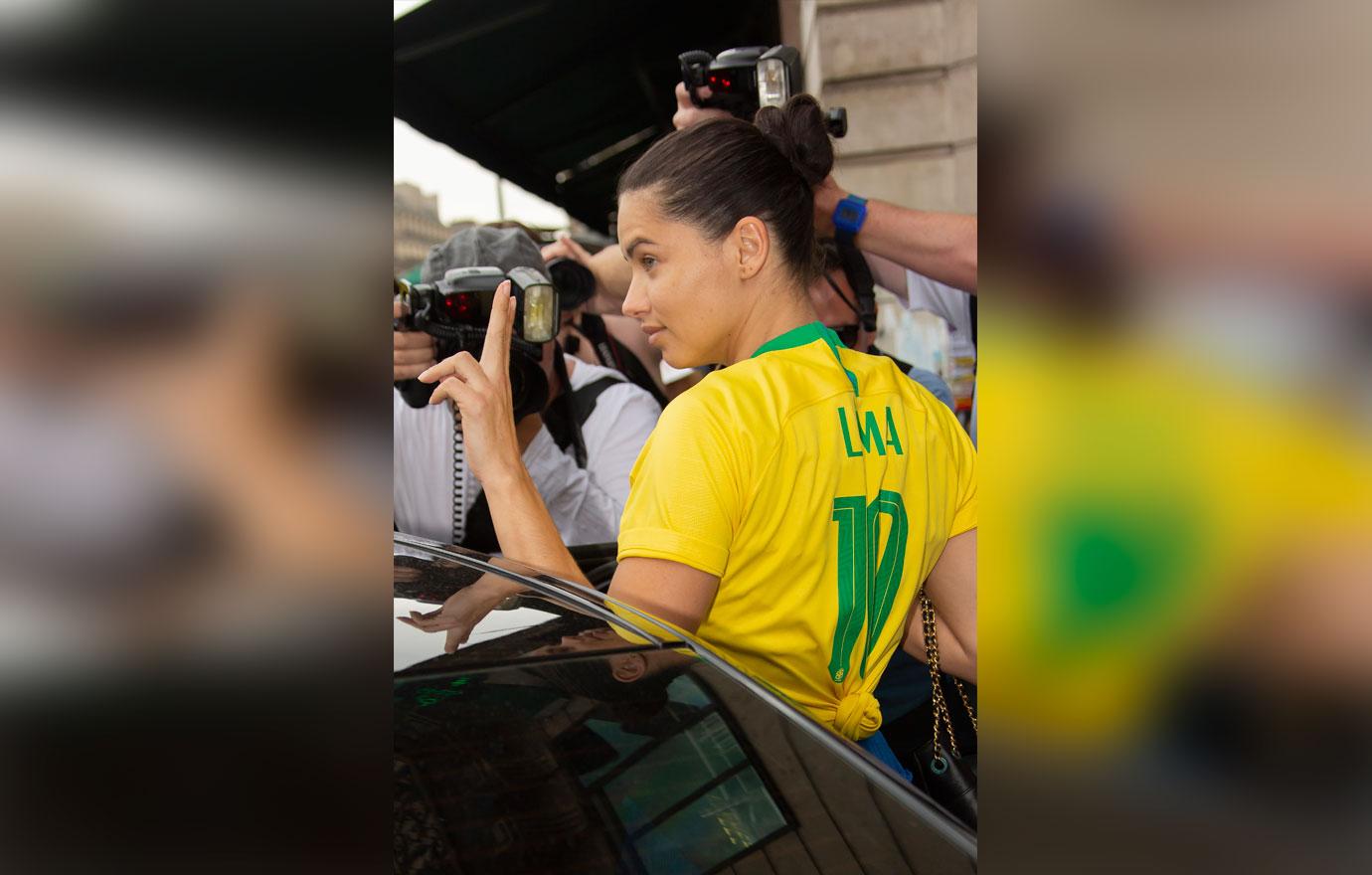 Adriana Lima Wears a Brazil Soccer Jersey At Couture Fashion Week