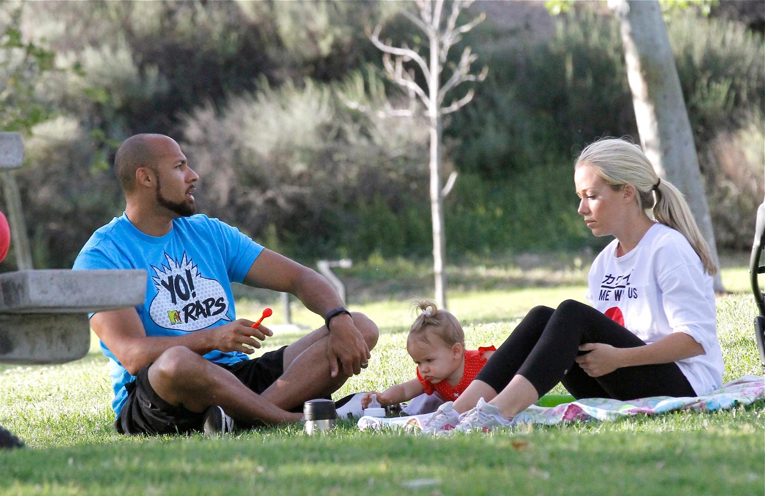 Kendra Wilkinson and Hank Baskett seen at the park with their kids