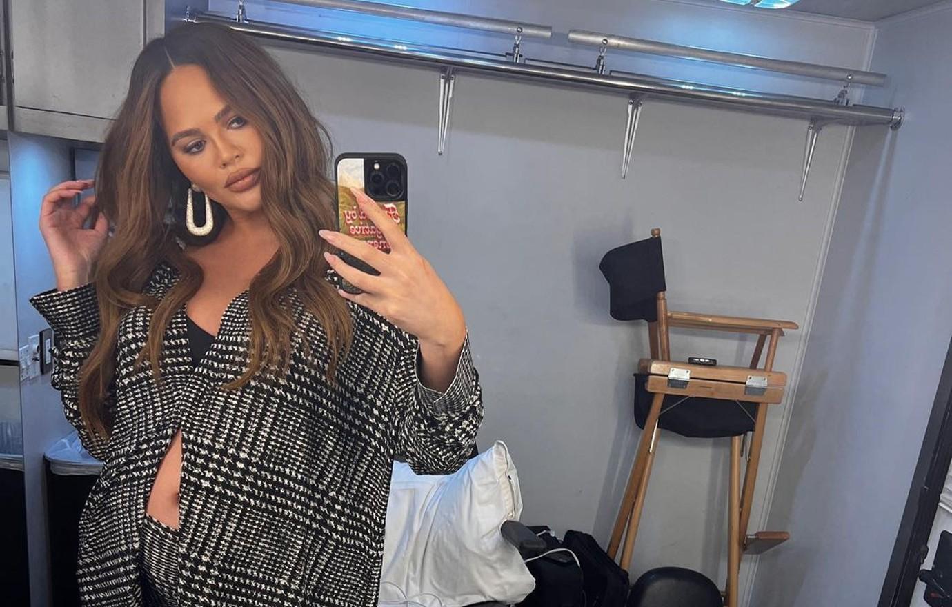 Pregnant Chrissy Teigen Shows Bare Baby Bump in Bathroom Selfie