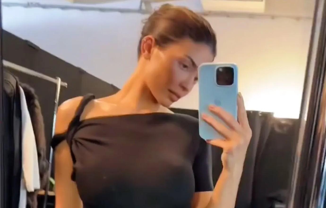 Bianca Censori steps out in 'wet' tank top and shocking cutout shorts