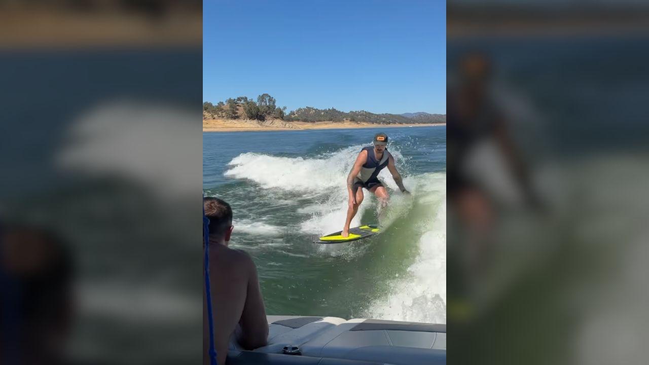Photo of The brothers tried their hand at wakeboarding.