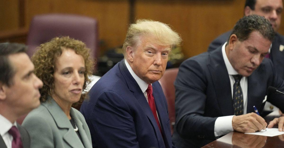 court employee arrested after approaching donald trump during trial