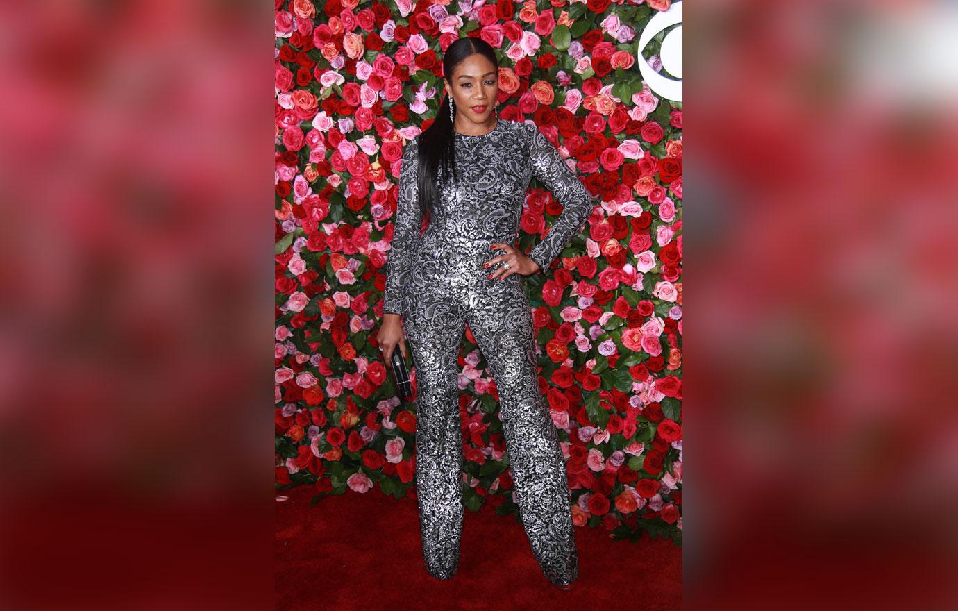 Tiffany haddish against rose wall