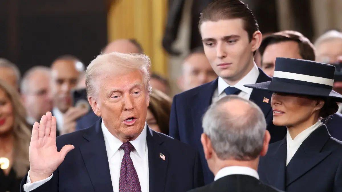 photo of donald trump with son barron trump and wife melania