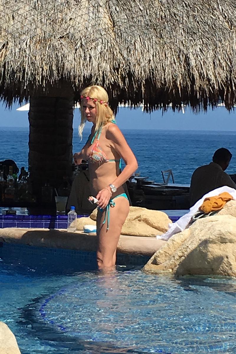 EXCLUSIVE: Tara Reid relaxes in a bikini at her hotel pool during a Mexican getaway