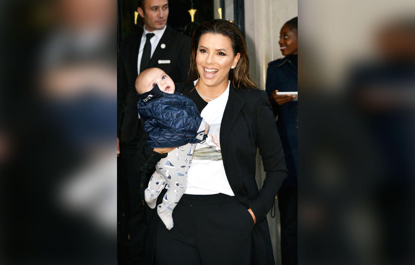 Eva Longoria and her baby leave the Hotel Georges V