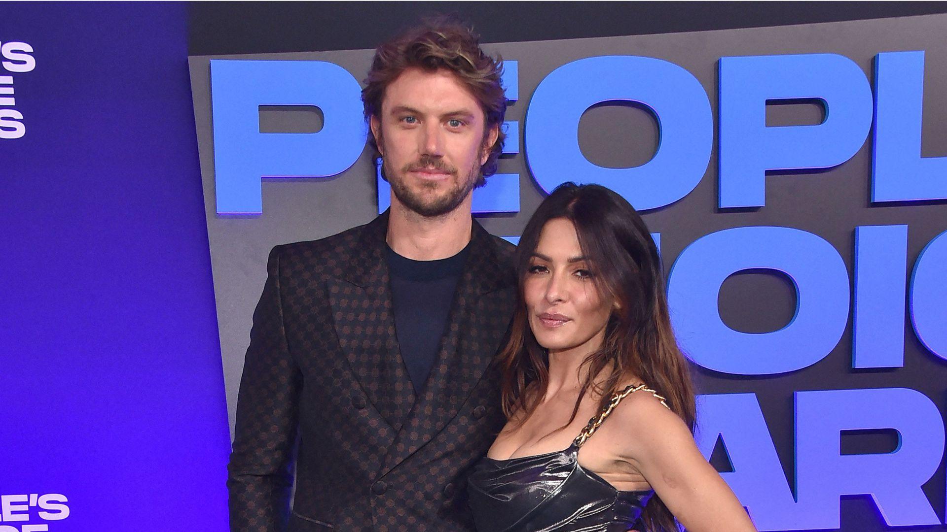 image of Adam Demos previously dated his ‘S--/Life’ costar Sarah Shahi for five years before their relationship ended.