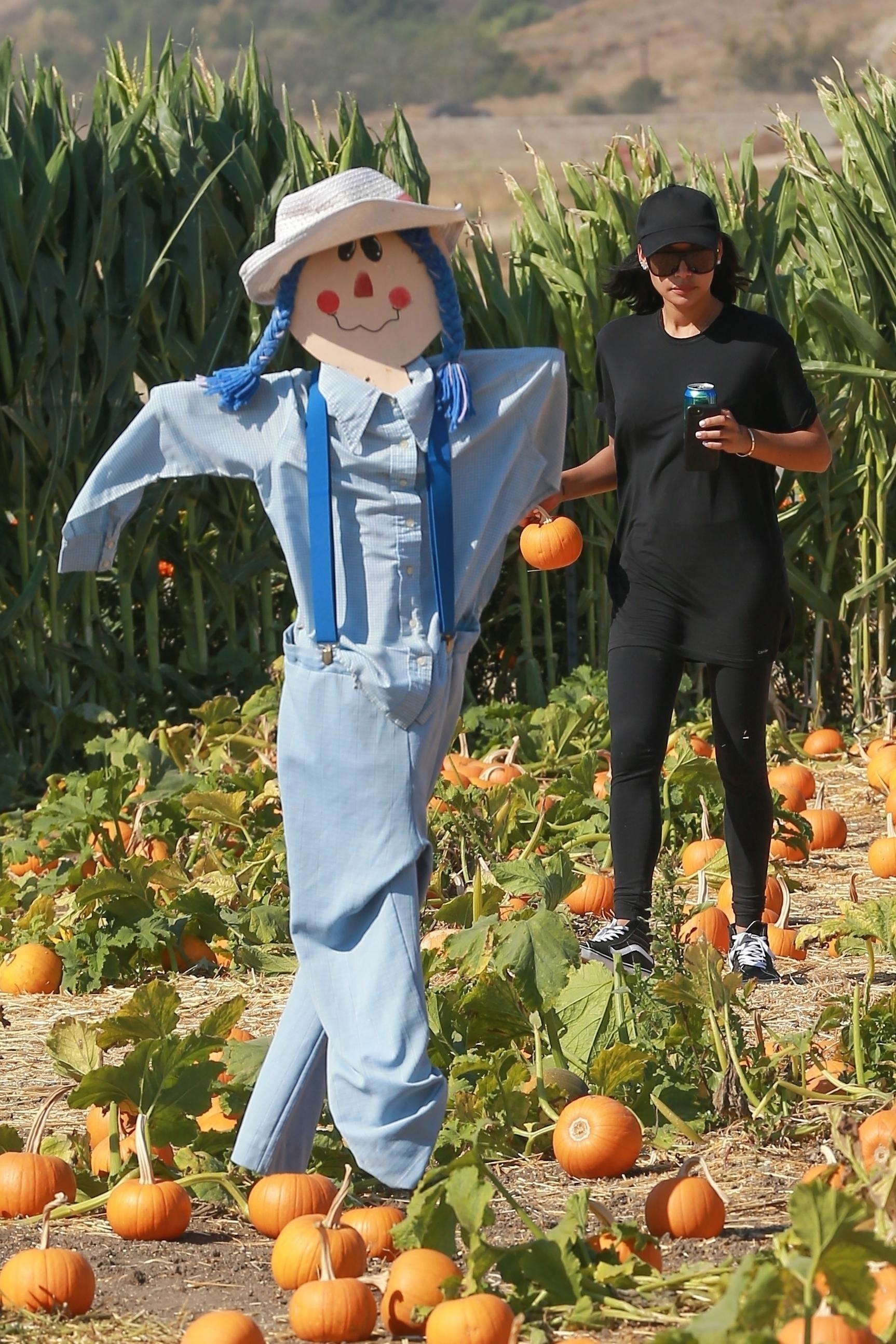 Naya Rivera and Ryan Dorsey take their son to Underwood family Farms to pick out a pumpkin