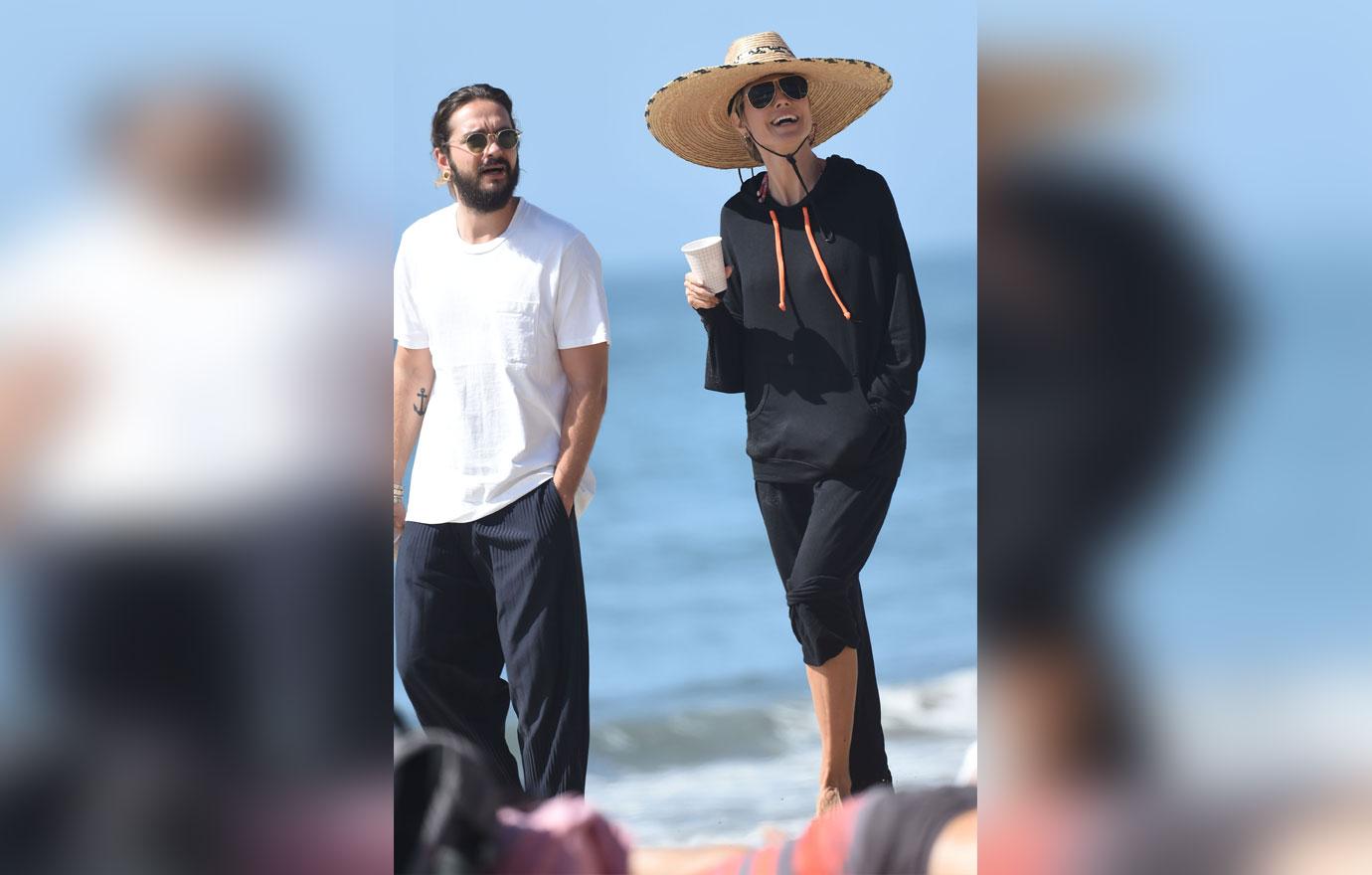 heidi klum and tom kaulitz enjoy a romantic walk on the beach