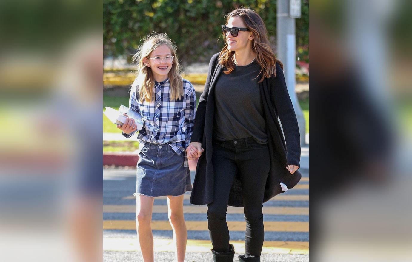 A happy Jennifer Garner takes daughter Violet to a doctors visit