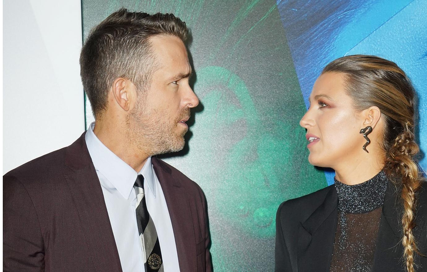 Blake Lively and Ryan Reynolds stare at each other