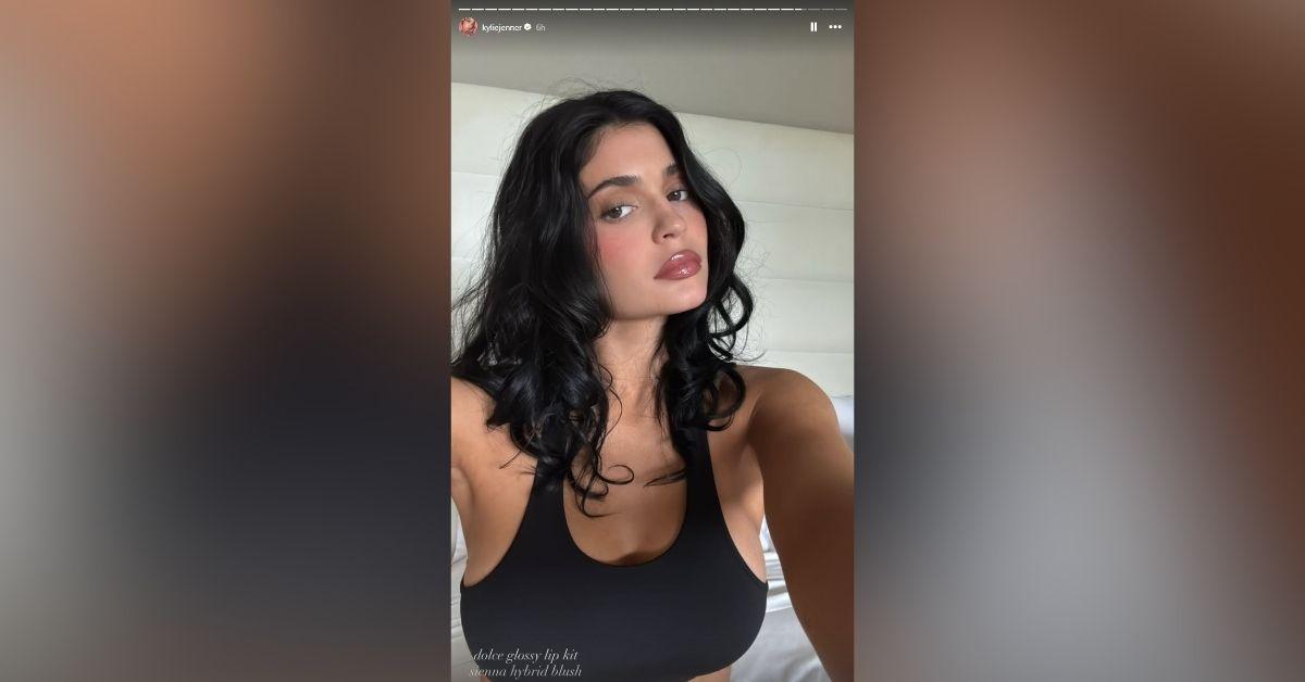 image of The reality star wore a black sports bra and cream joggers.