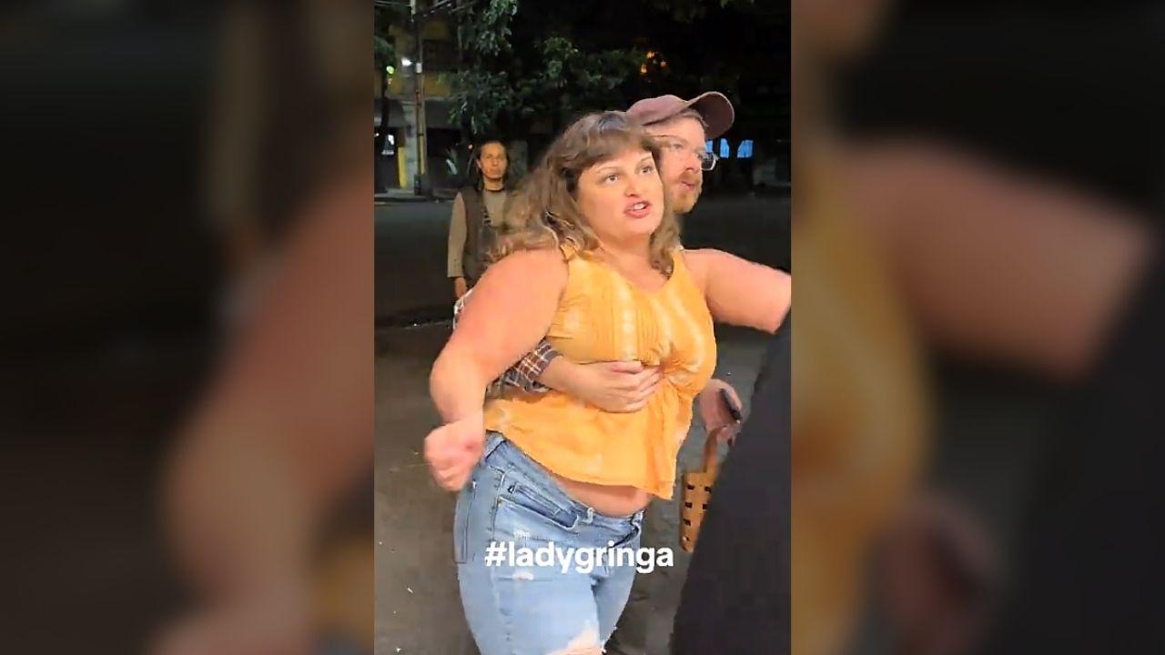 Image of the woman allegedly questioned taco shop workers about their annual earnings during the confrontation.