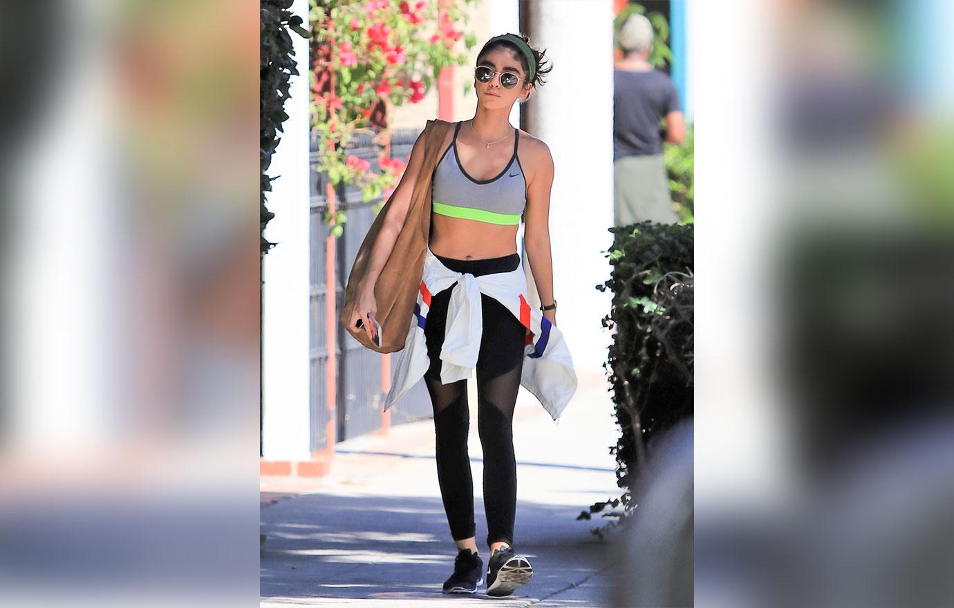 Sarah Hyland showcases her gym-toned abs in sports bra and tight leggings  after working out