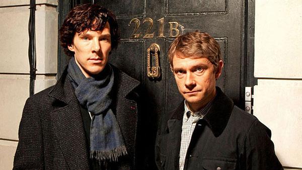 Benedict Cumberbatch and Martin Freeman as Sherlock and Watson