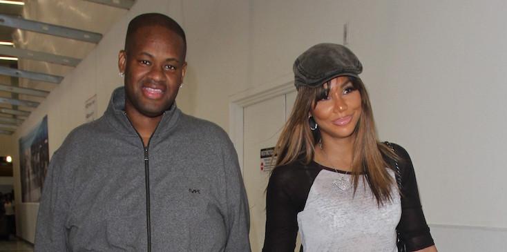 Tamar Braxton and Vincent Herbert depart LAX with their hands locked