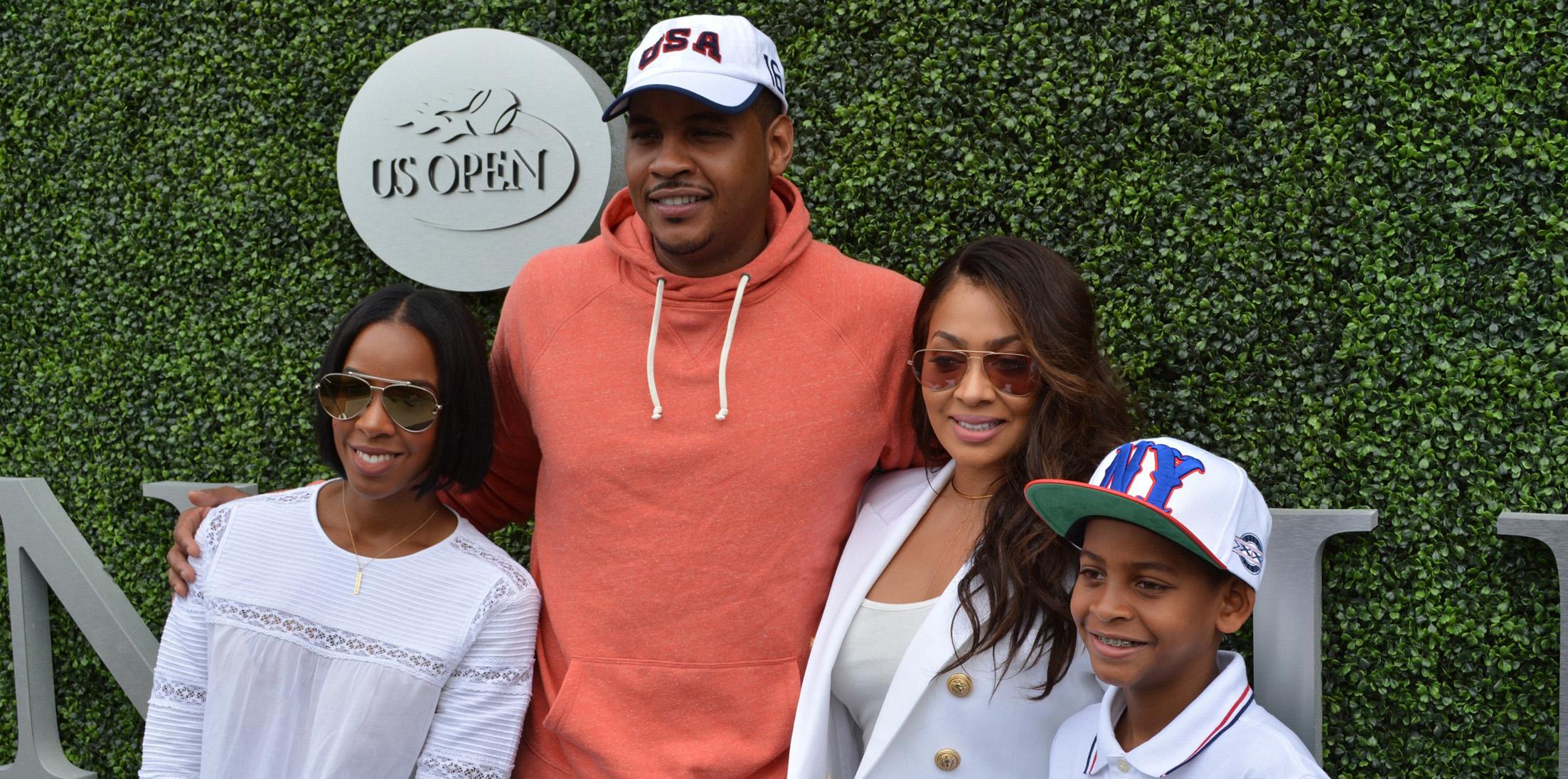 Kelly Rowland poses for pictures with Carmelo Anthony and his family