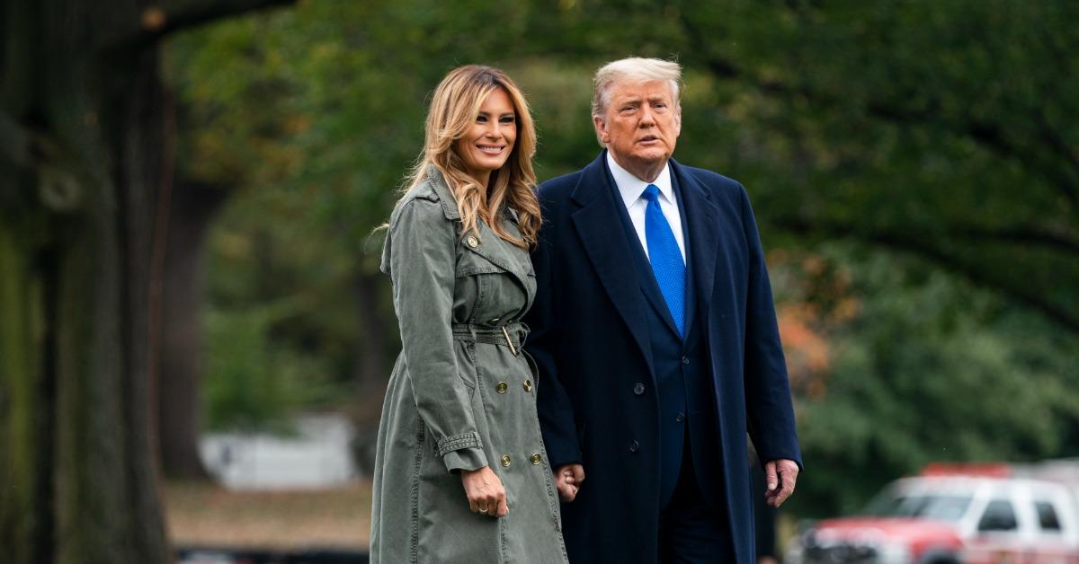 Photo of Melania and Donald Trump walking.