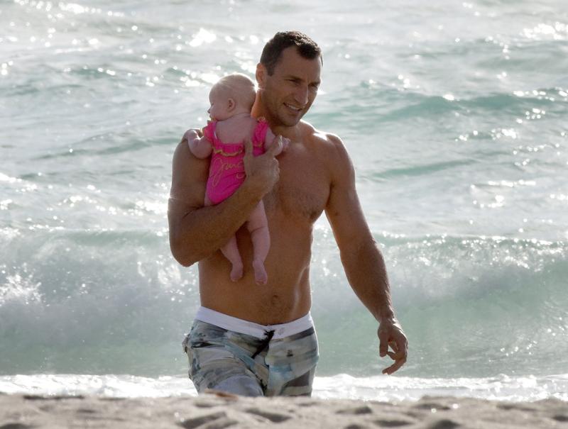 EXCLUSIVE: ***NO WEB USAGE BEFORE 9PM PST, TUESDAY APRIL 21, 2015.*** INF &#8211; Heavyweight Champion Wladimir Klitschko Shows His Soft Side Playing At The Beach With His Daughter Kaya In Miami