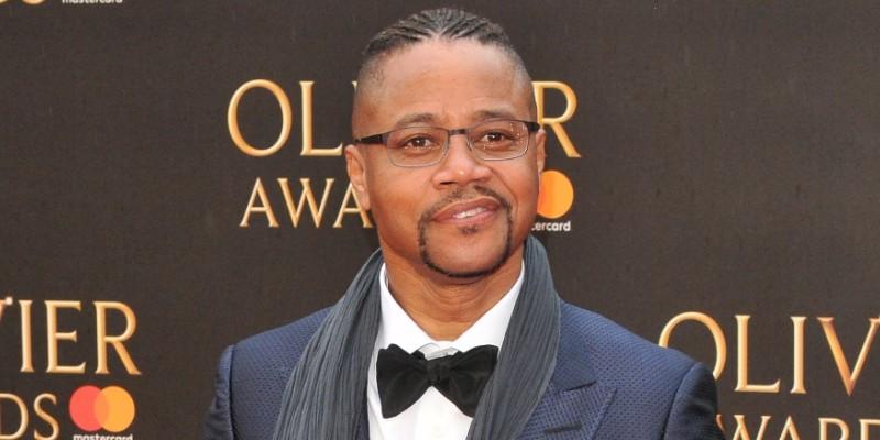 Cuba Gooding Jr. Wearing a Suit on A Red Carpet