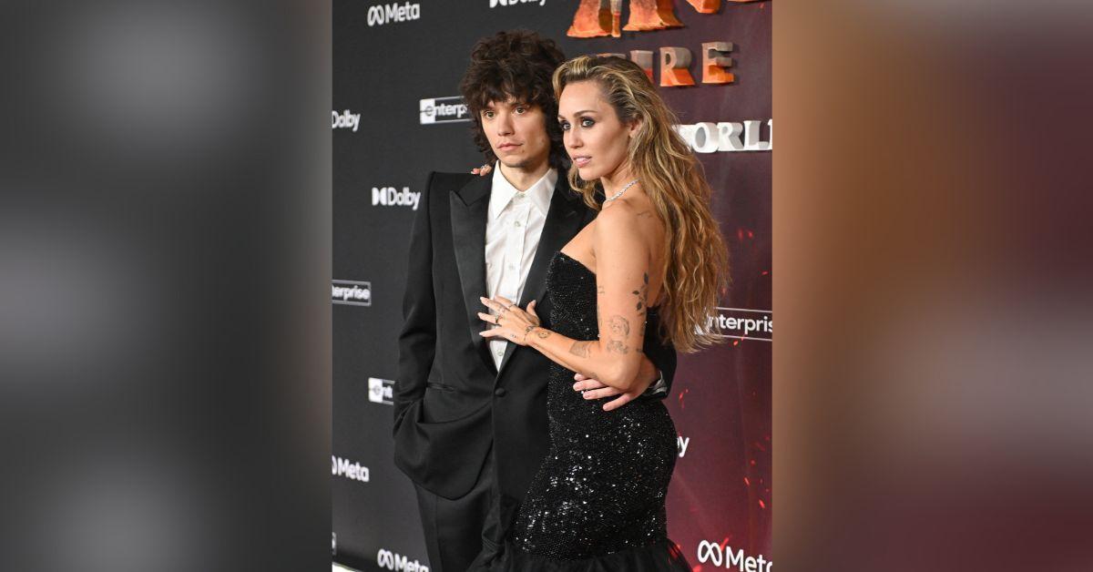 Image of Miley Cyrus and Maxx Morando matched on the red carpet.