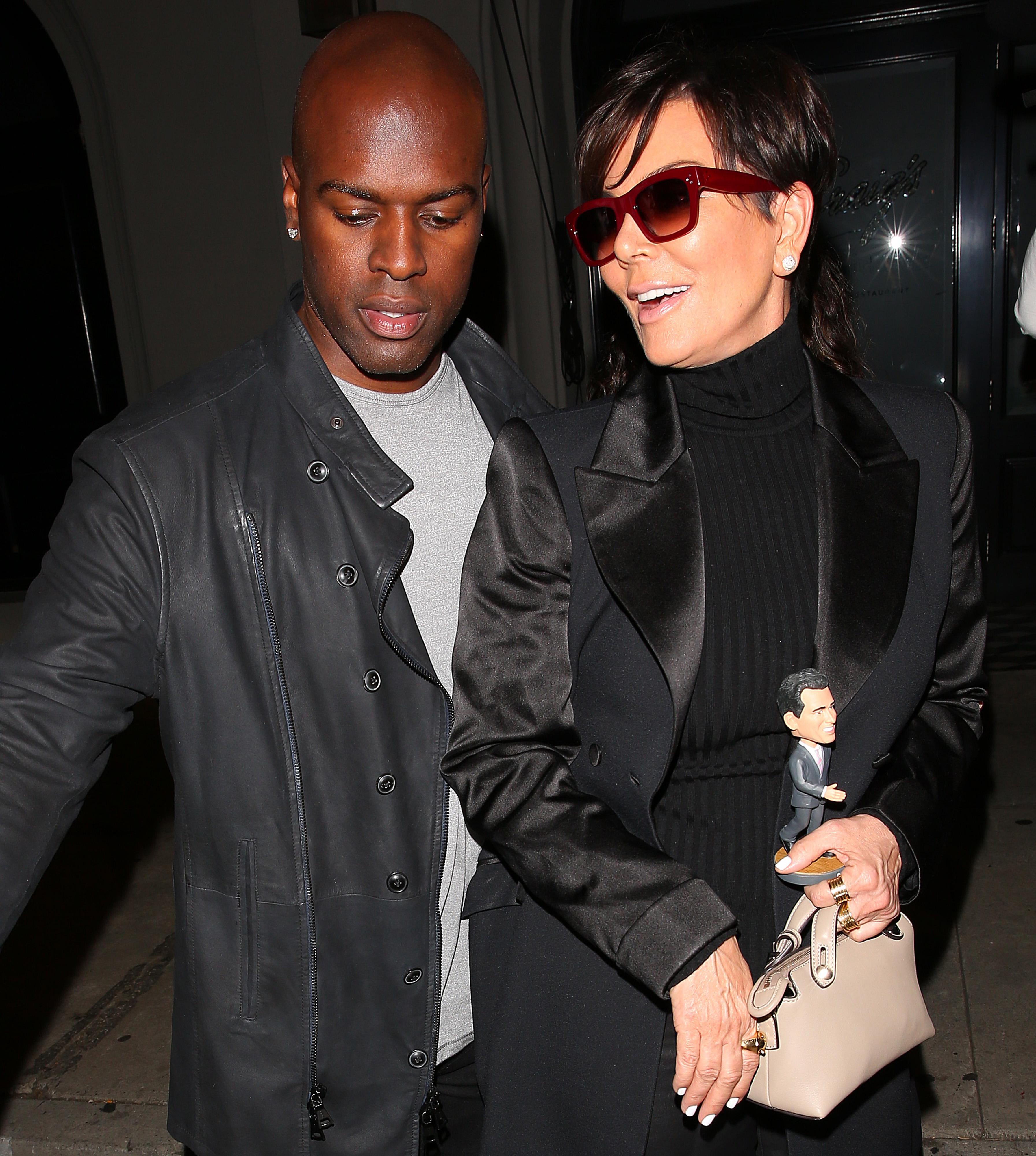 Kris Jenner carrying a &#8216;Bobble head&#8217; with her boyfriend Corey Gamble were seen at &#8216;Craigs&#8217; Restaurant in West Hollywood, CA