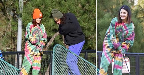 vanessa hudgens and her boyfriend cole tucker hit the driving range on new years eve