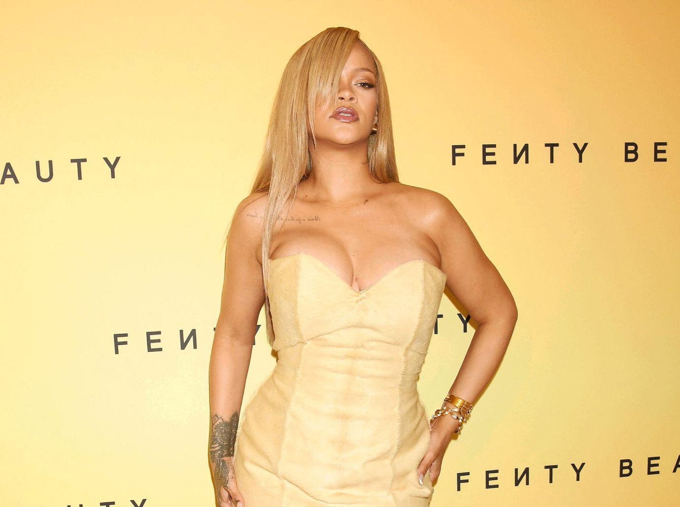 rihanna lifts skirt shows behind summer goal underwear shoes match watch