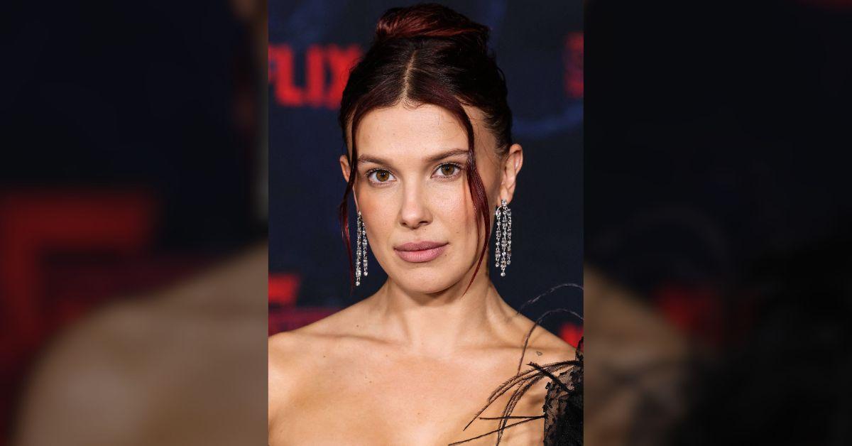 image of The actress paired her bikini with layered necklaces, gold hoops and chic sunglasses.