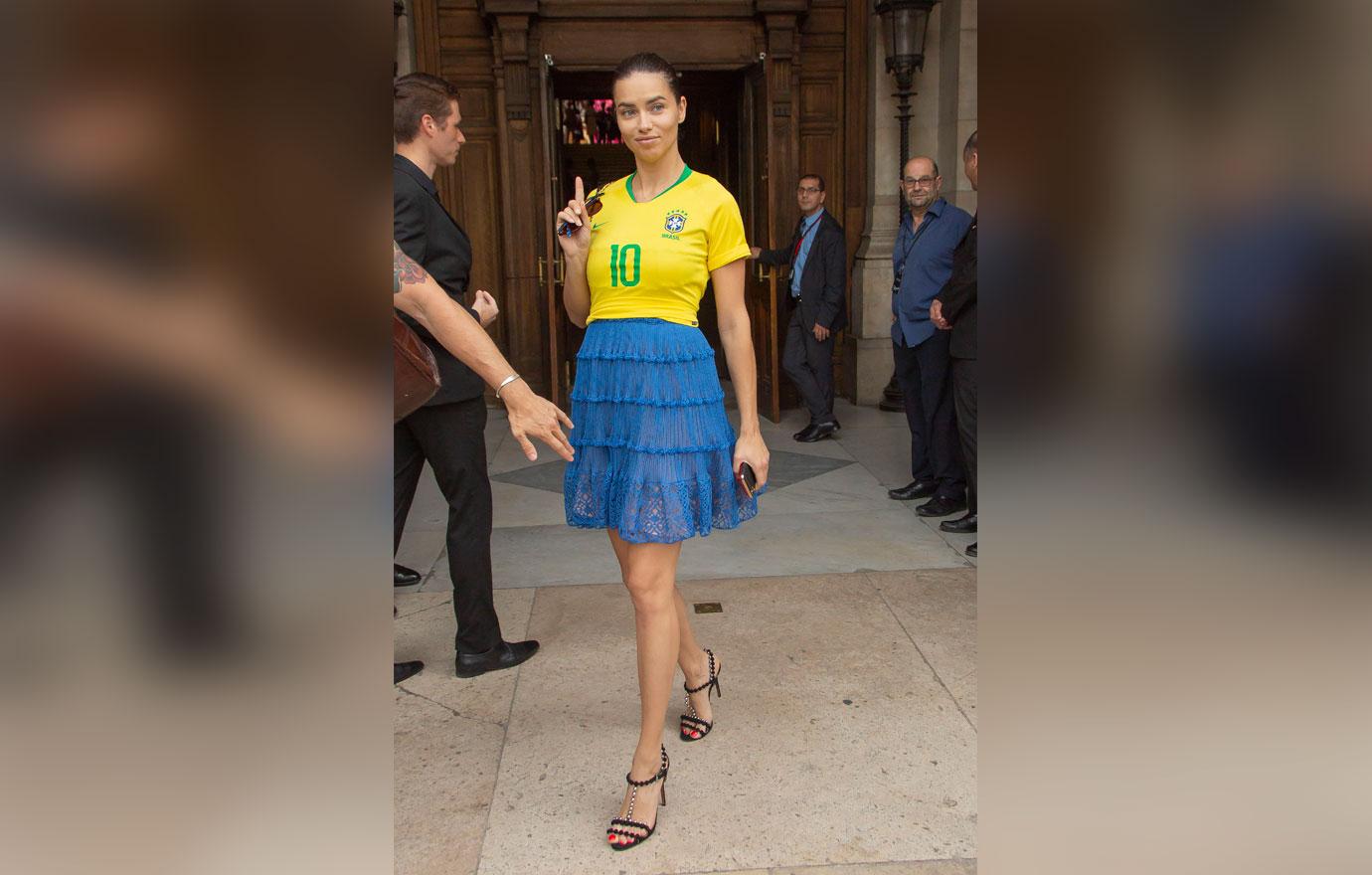 Adriana Lima Wears a Brazil Soccer Jersey At Couture Fashion Week