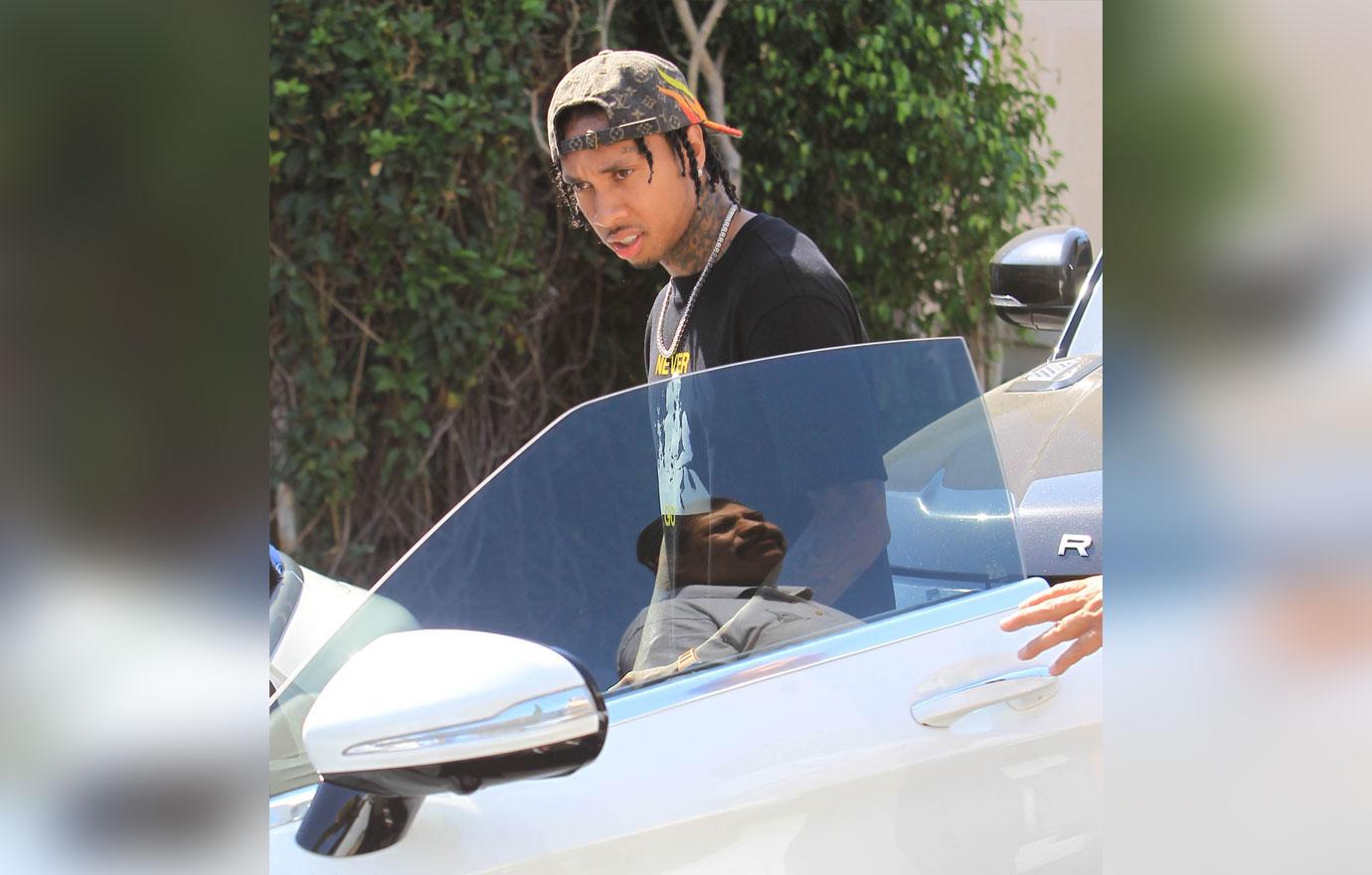 Tyga getting into car