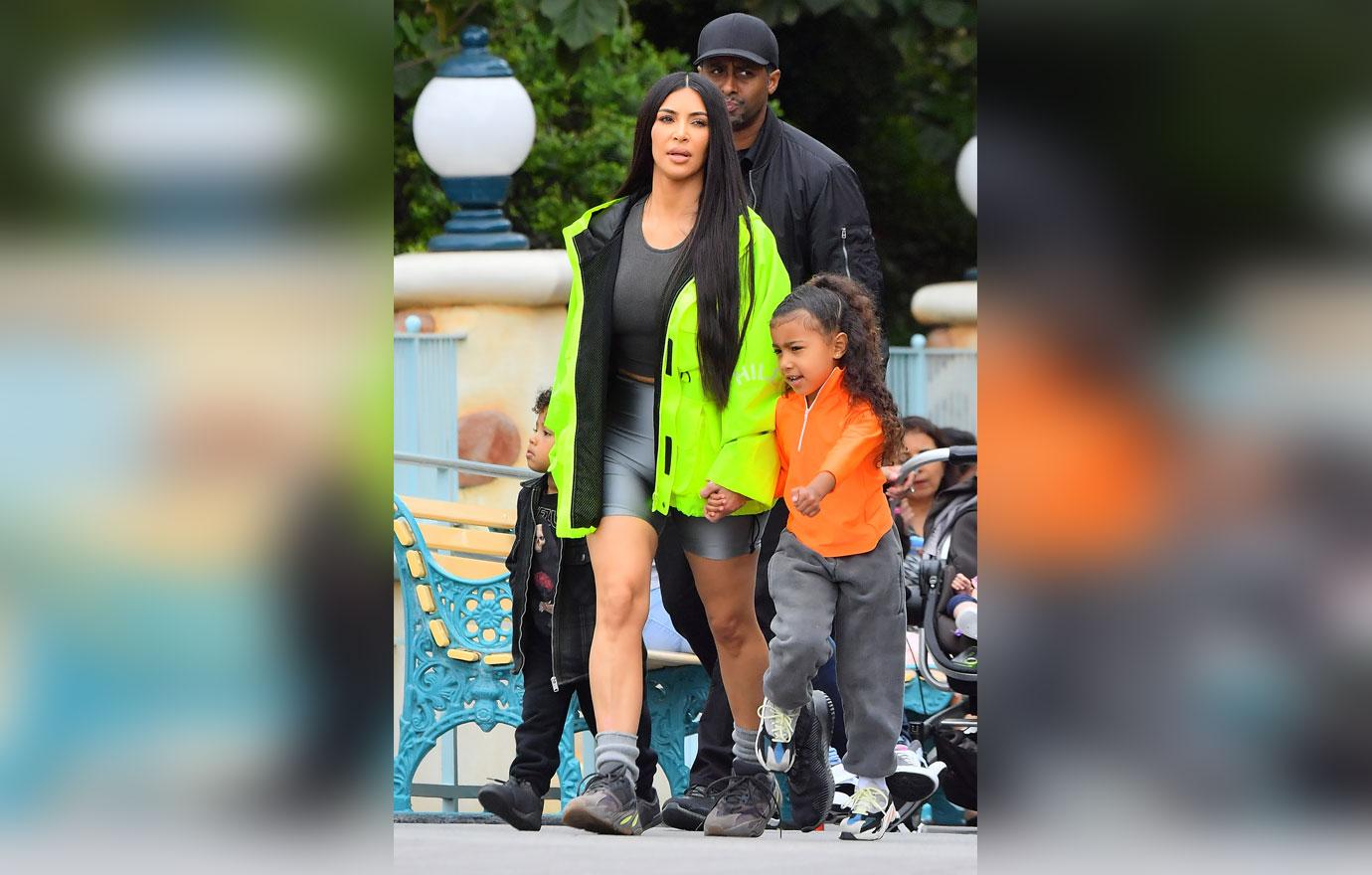 EXCLUSIVE: Kim &amp; Kourtney Kardashian enjoy a day at Disneyland with their kids in Anaheim, CA.