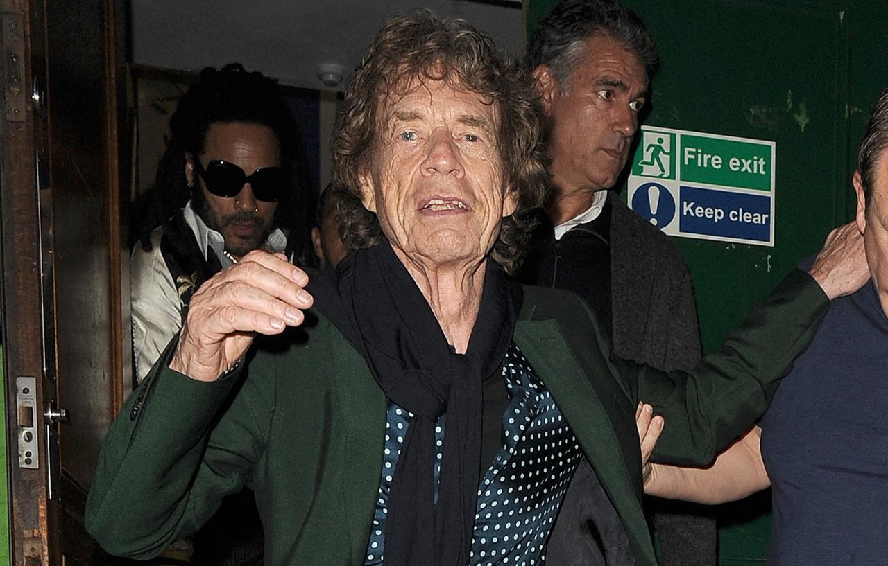 Mick Jagger Assisted By Security While Leaving 80th Birthday Party