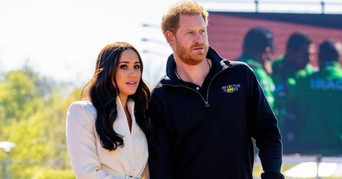 prince harry and meghan markle looking surprised