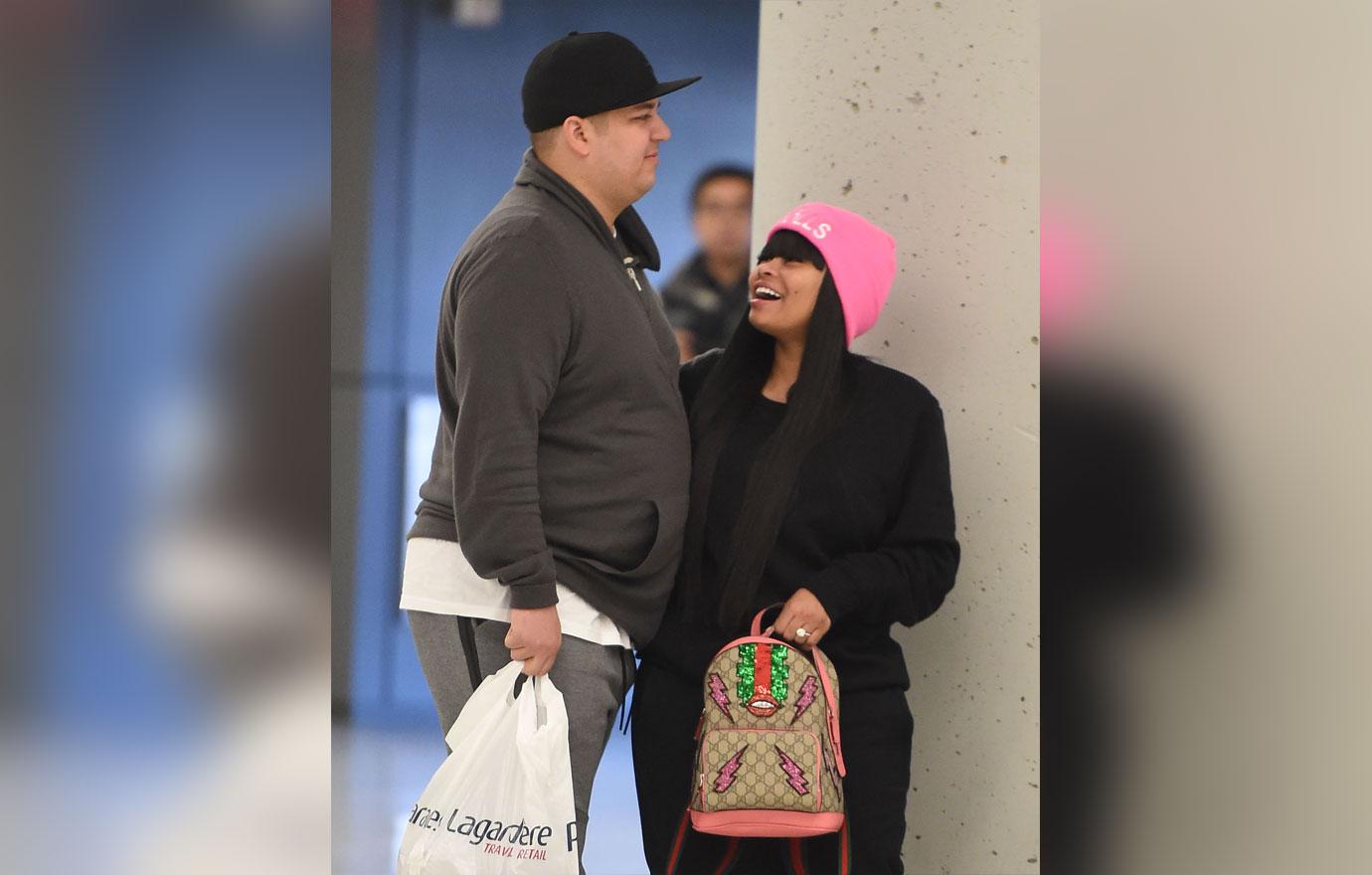 Rob Kardashian and Blac Chyna arrive at JFK airport in NYC.