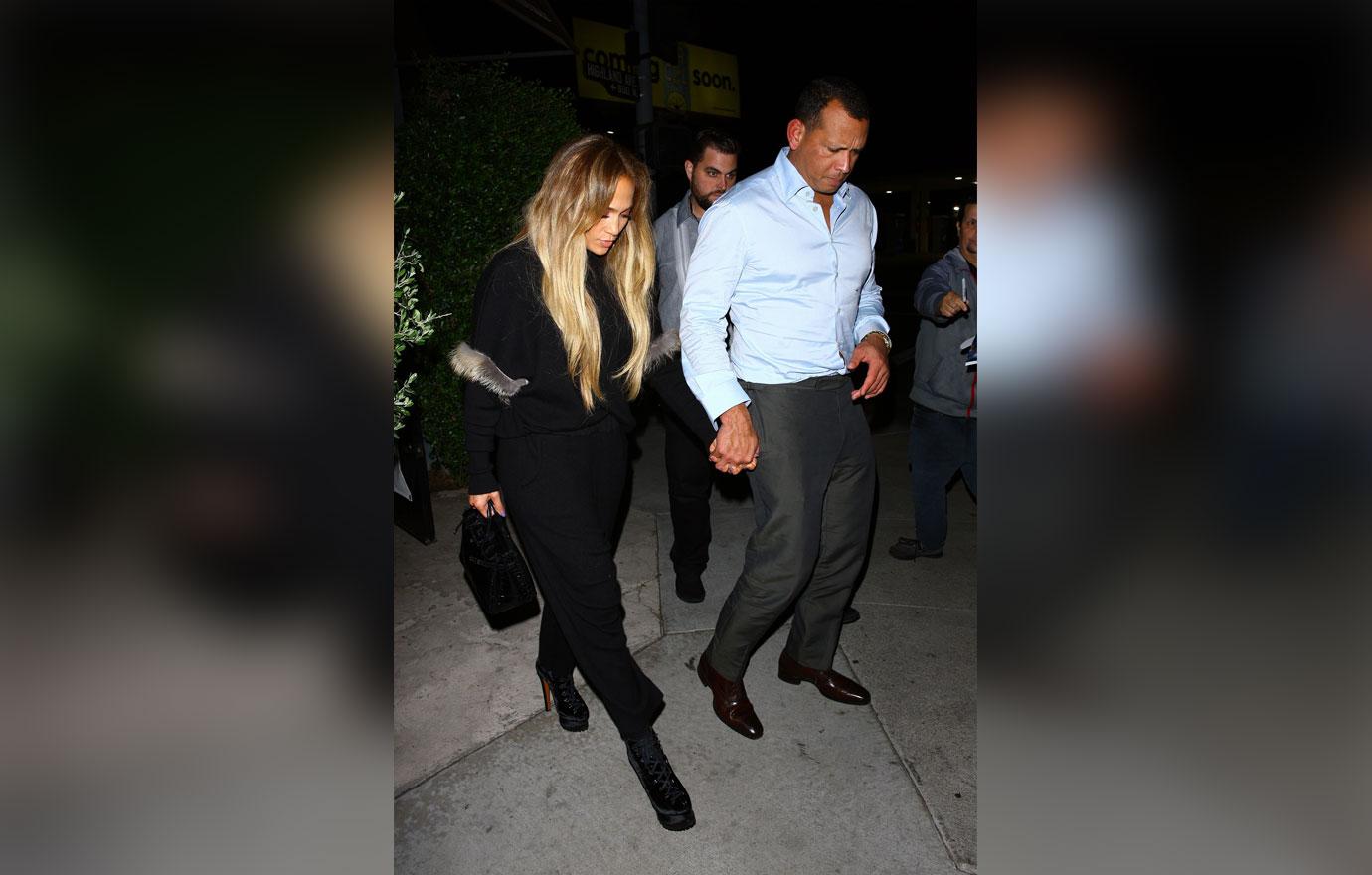 EXCLUSIVE: Jennifer Lopez holds hands with Alex Rodriguez as they leave Italian restaurant Osteria Mozza after having a romantic dinner