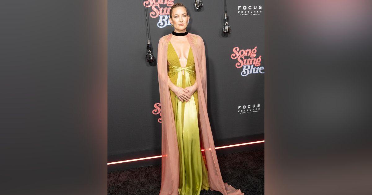 image of Kate Hudson wore a daring green Valentino gown at a New York City premiere.