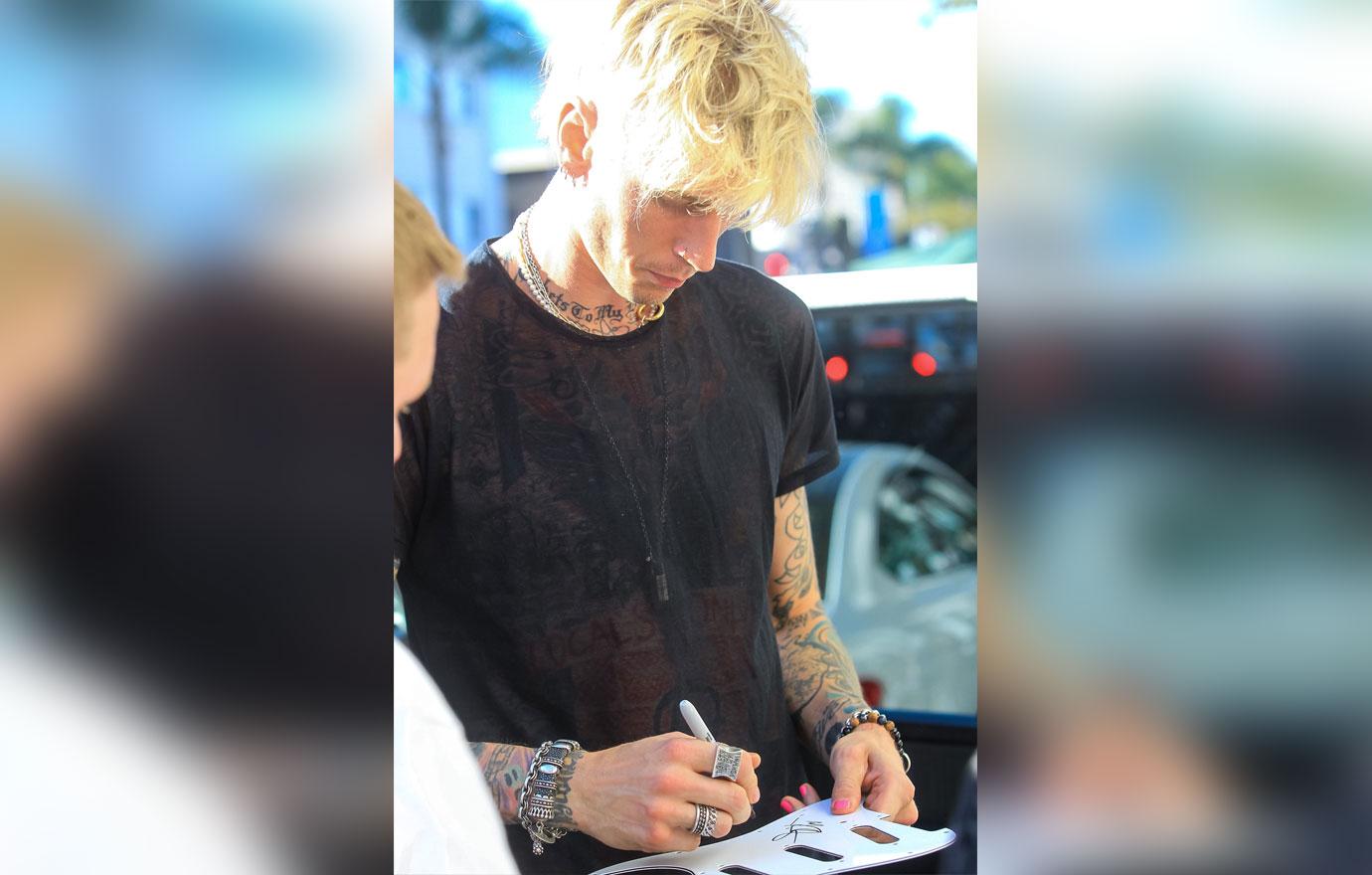 Machine Gun Kelly signs autographs in West Hollywood