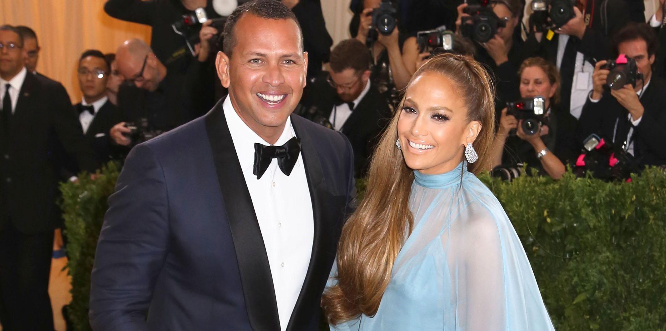 Alex Rodriguez and Jennifer Lopez pose together at the 2017 Met Gala