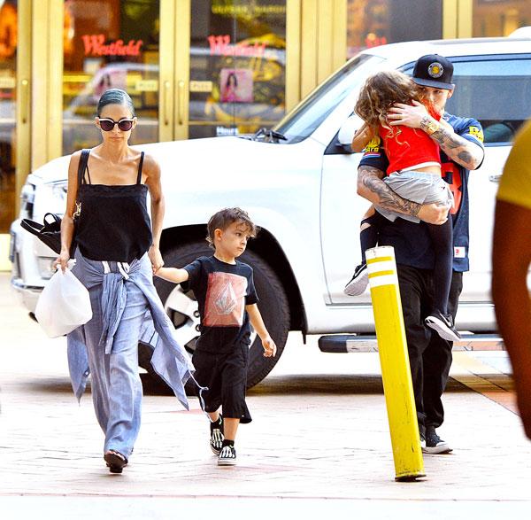 EXCLUSIVE: Nicole Richie and husband Joel Madden spotted leaving a mall with their kids after a shopping trip in Los Angeles, CA