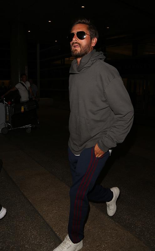 Scott Disick arrives to LAX after flying solo