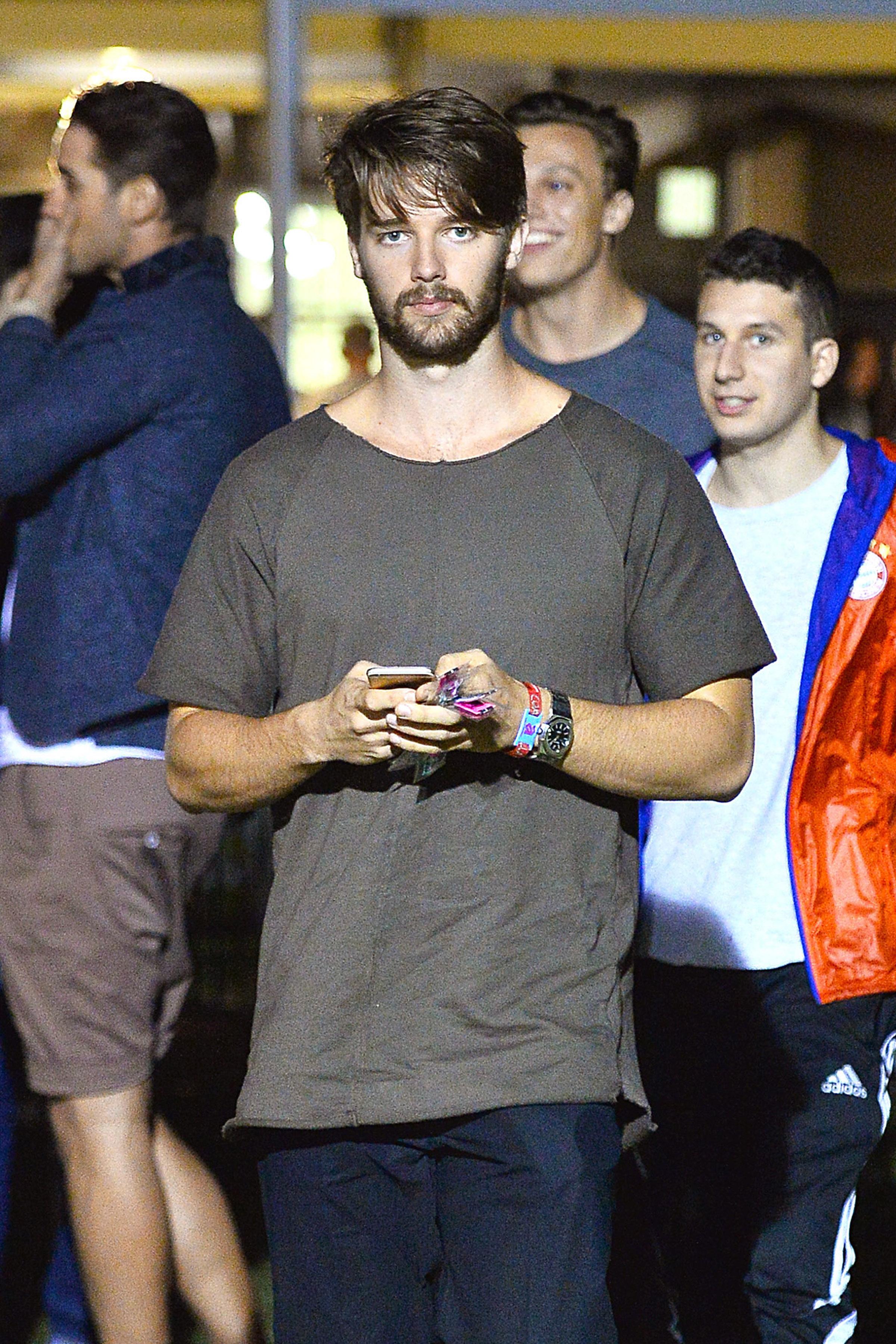 Patrick Schwarzenegger spotted hanging out at Coachella without Miley Cyrus.