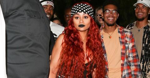 Blac Chyna is hard to miss in all polka dots as she sports red hair