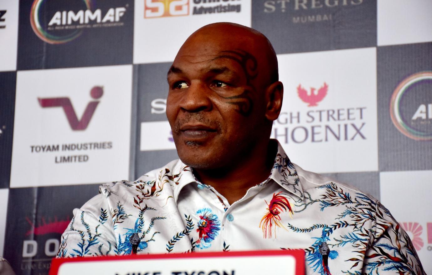 boxer mike tyson punches passenger flight shocking footage