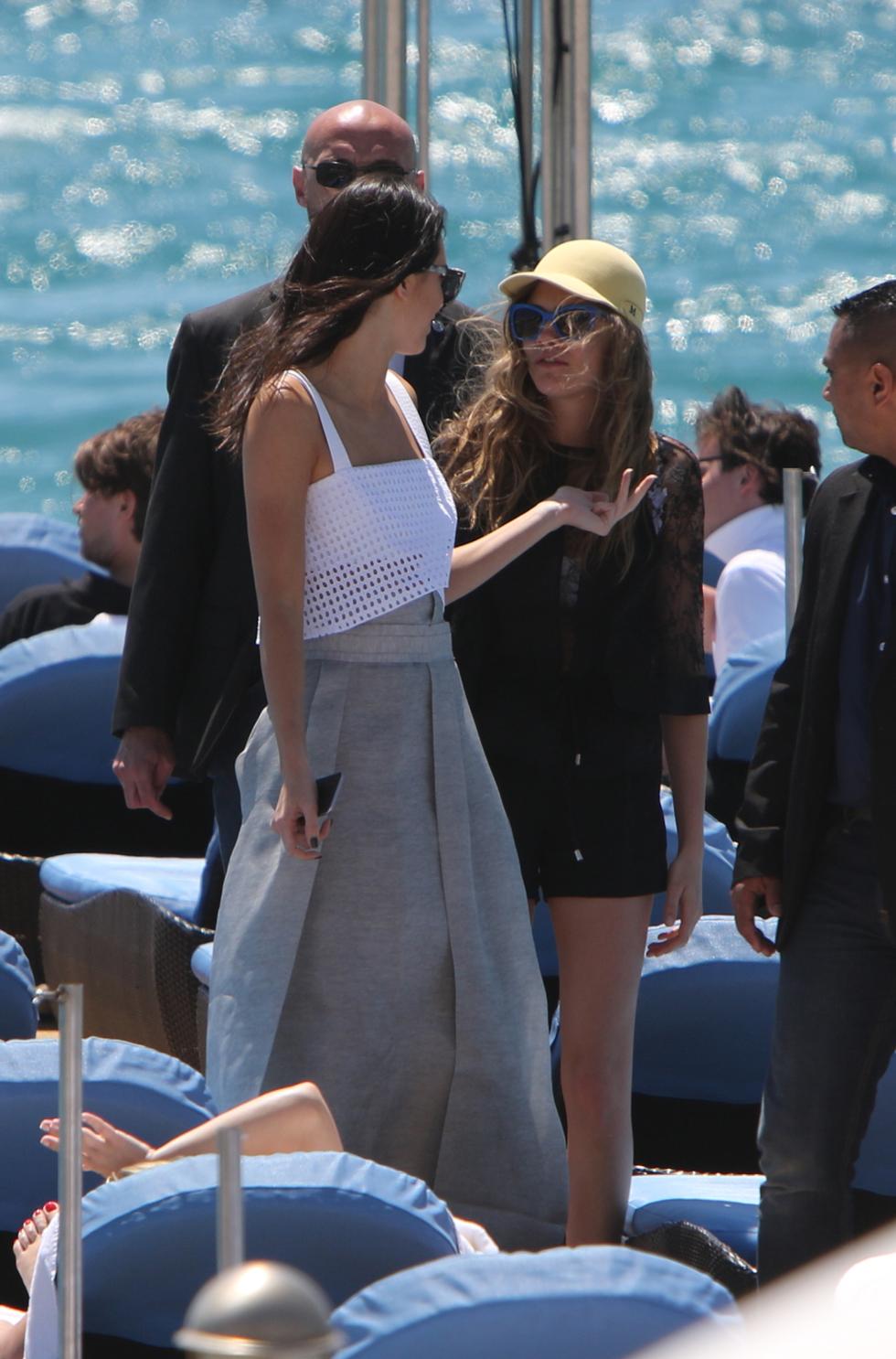 Cara Delevingne and Kendall Jenner at Beach Martinez in Cannes