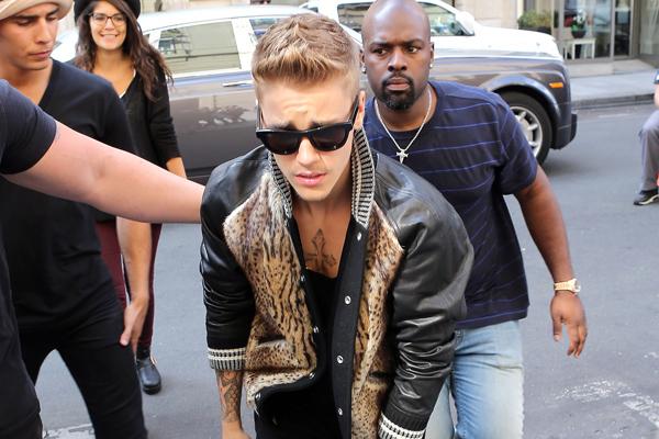 Justin Bieber shopping at Yves Saint Laurent in Paris