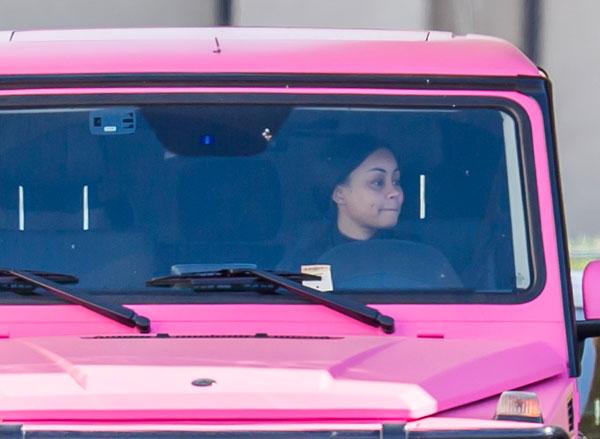 Kylie Jenner wears Chanel crop top as she reclines on her newly repainted  beige G-Wagon