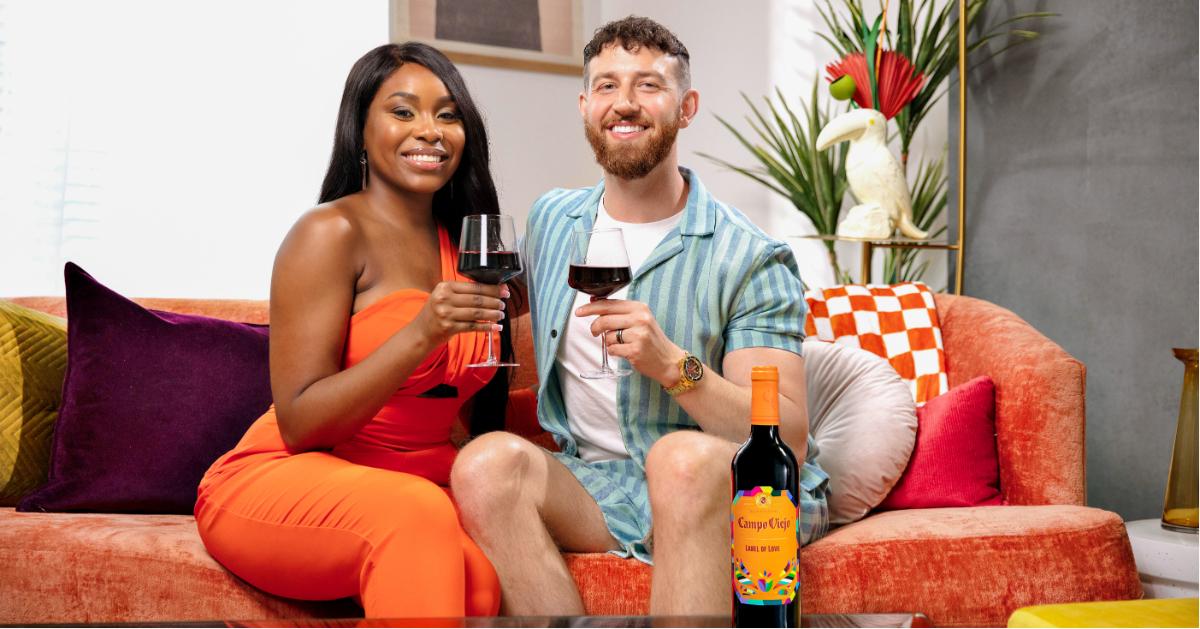 https://media.okmagazine.com/brand-img/qBsHYO-e8/0x0/love-is-blind-cameron-lauren-relationship-advice-wine-campo-viejo-1656625947156.jpg