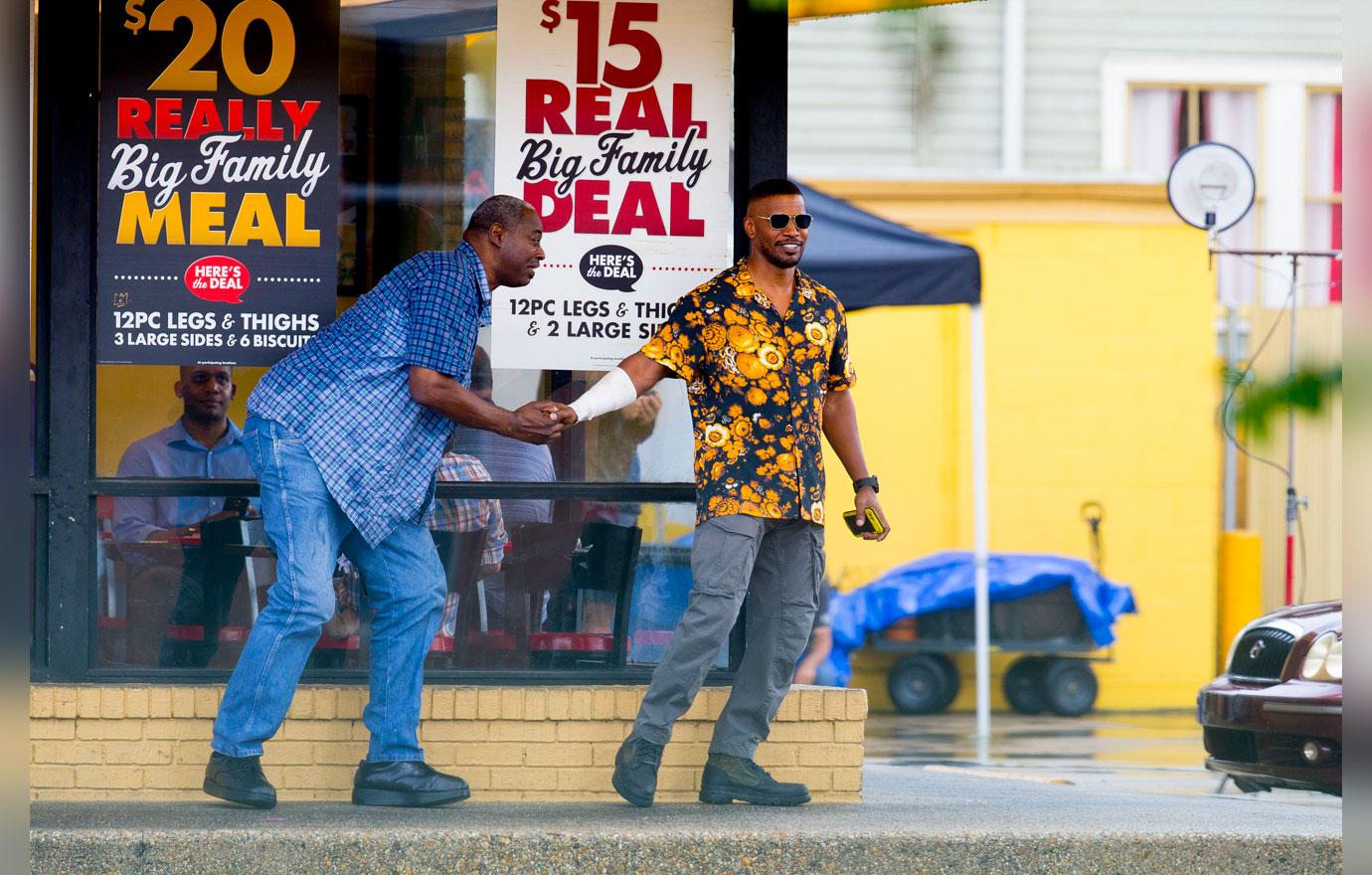 EXCLUSIVE: Jamie Foxx and Joseph Gordon Levitt are seen for the first time on the set of his new Netflix movie &#8216;Power&#8217; looking bloodied and beaten.